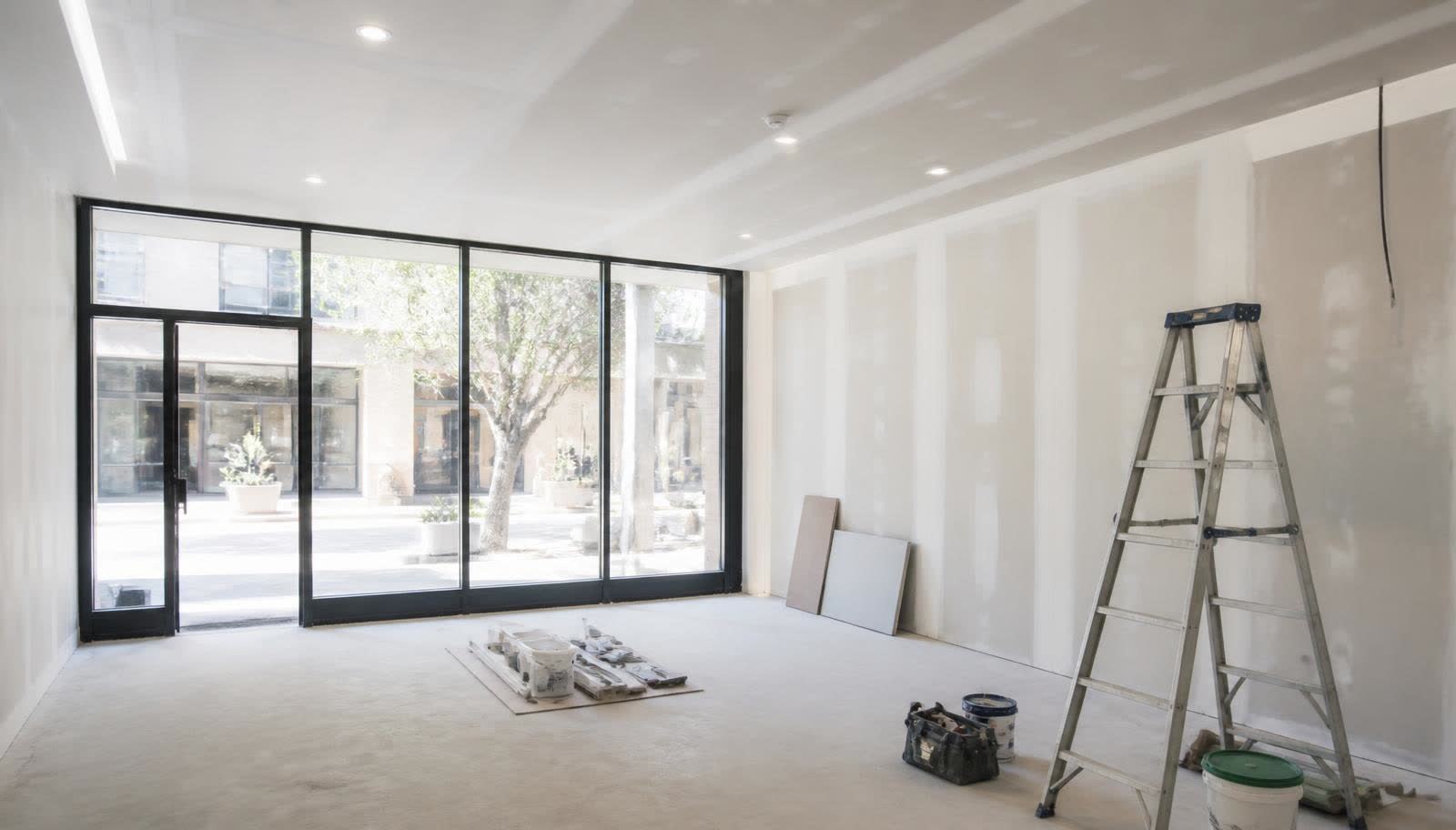 Empty retail tenancy interior during wall and ceiling repair works
