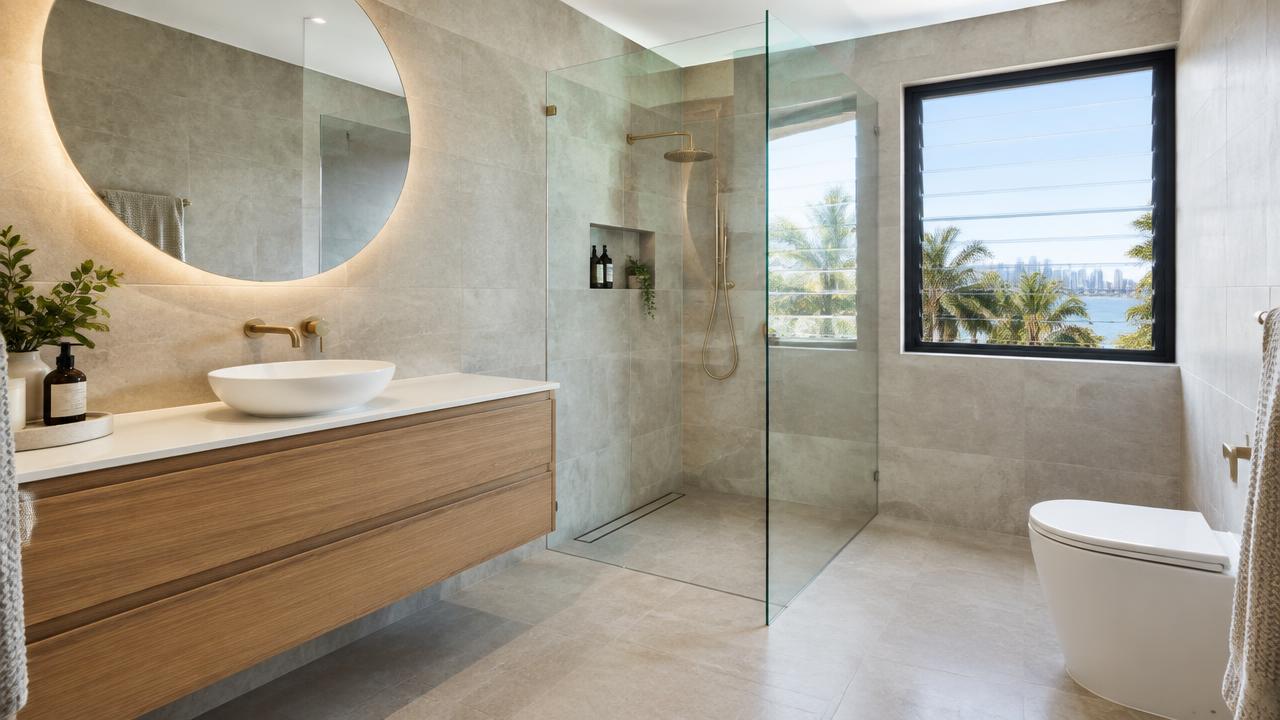 Newly renovated Gold Coast bathroom with freestanding bath and floor to ceiling tiles