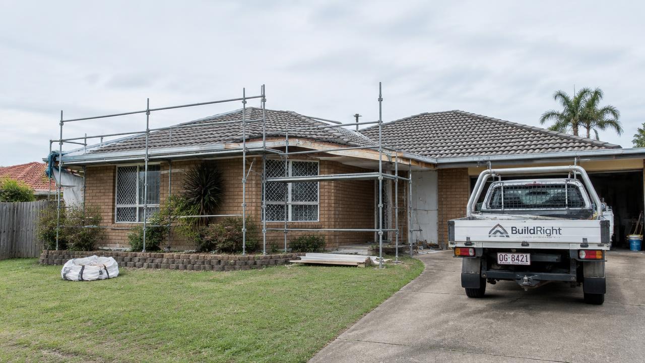 Renovated brick home in Logan with new carpentry and landscaping