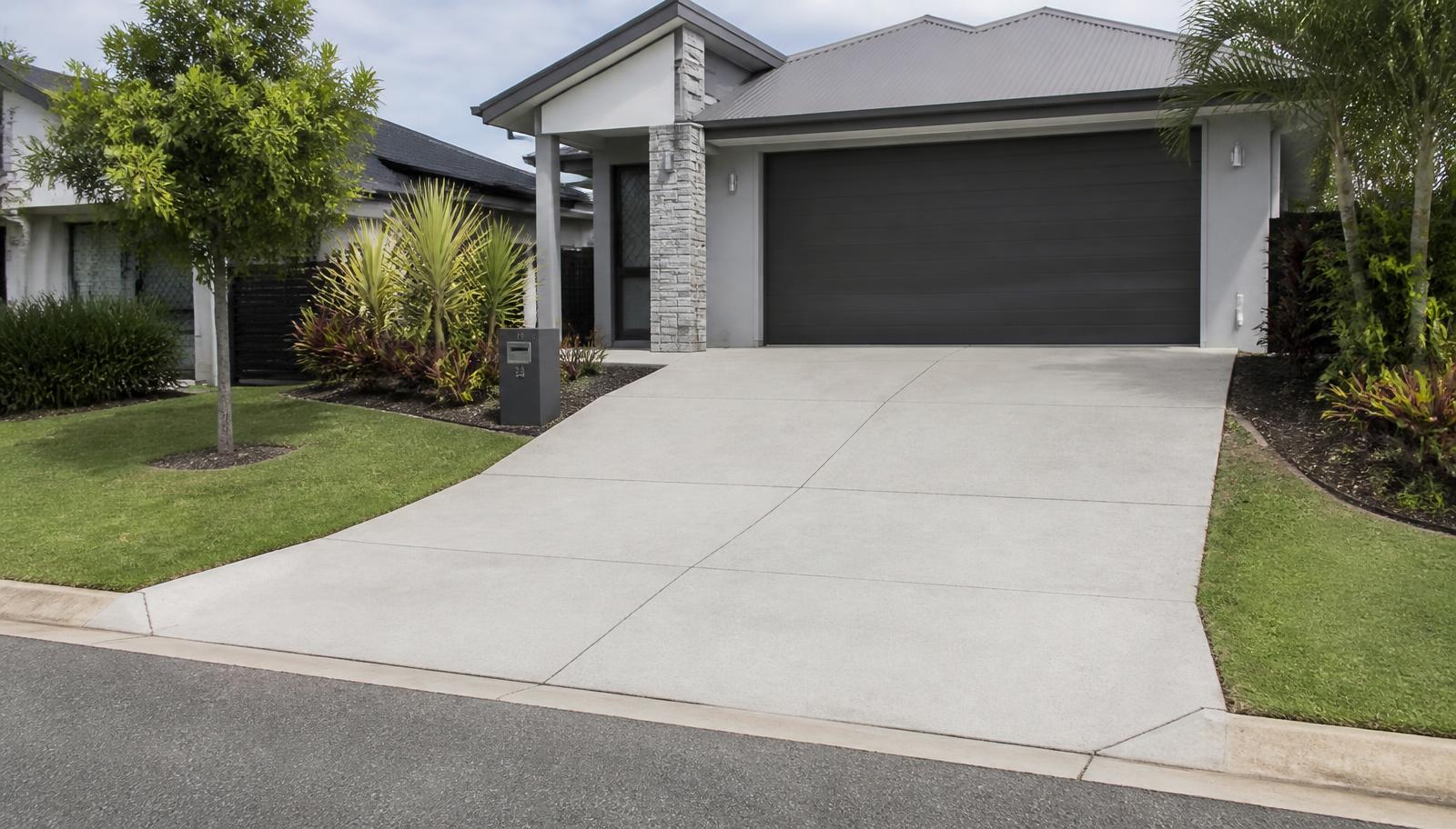 Plain broom finished concrete driveway at an Australian home