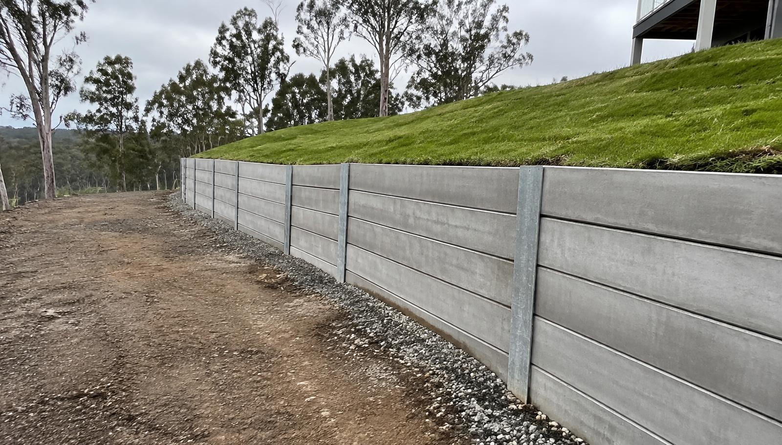 Sleeper retaining wall in a Gold Coast backyard